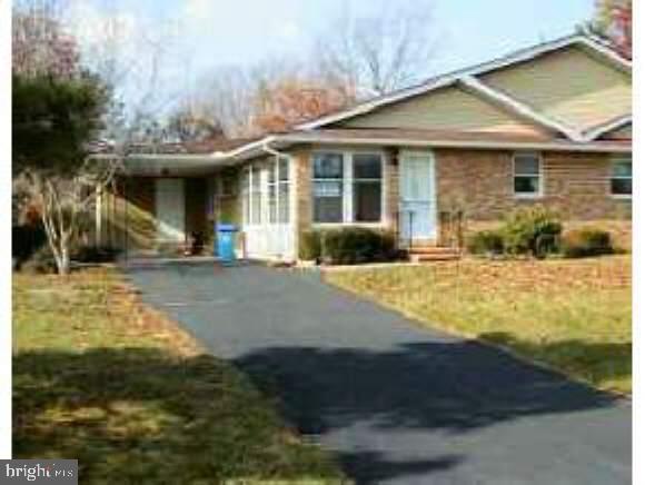 14 Cranberry Road Manahawkin, NJ 08050 - Photo 1 of 1 a front view of a house with a yard