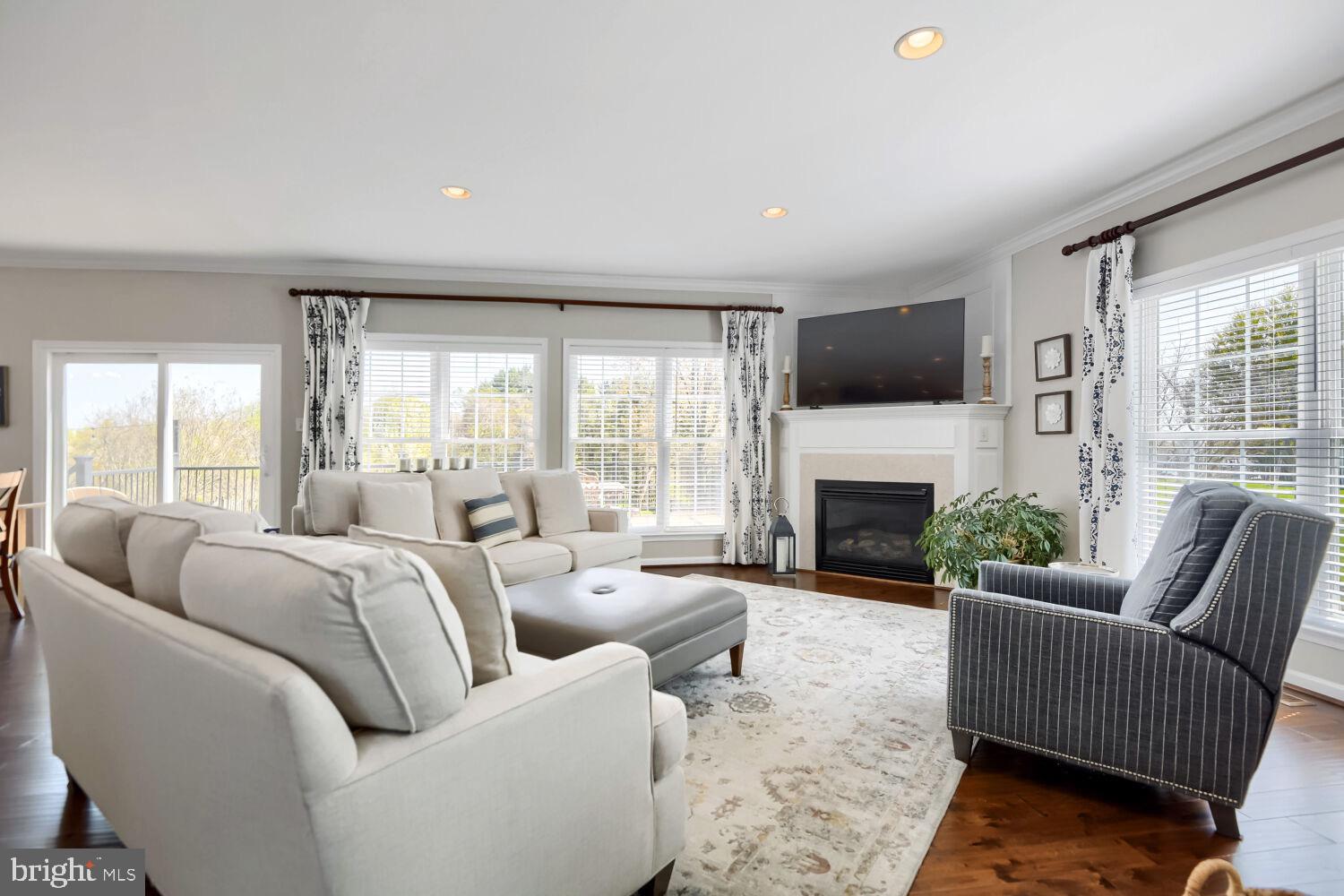 9805 Colenbourne Road Perry Hall, MD 21128 - Photo 6 of 43 Family room with fireplace & a view