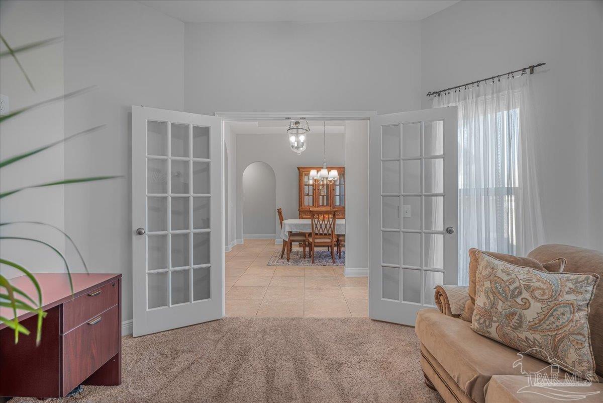 5997 Stonechase Boulevard Pace, FL 32571 - Photo 12 of 52 a living room with furniture
