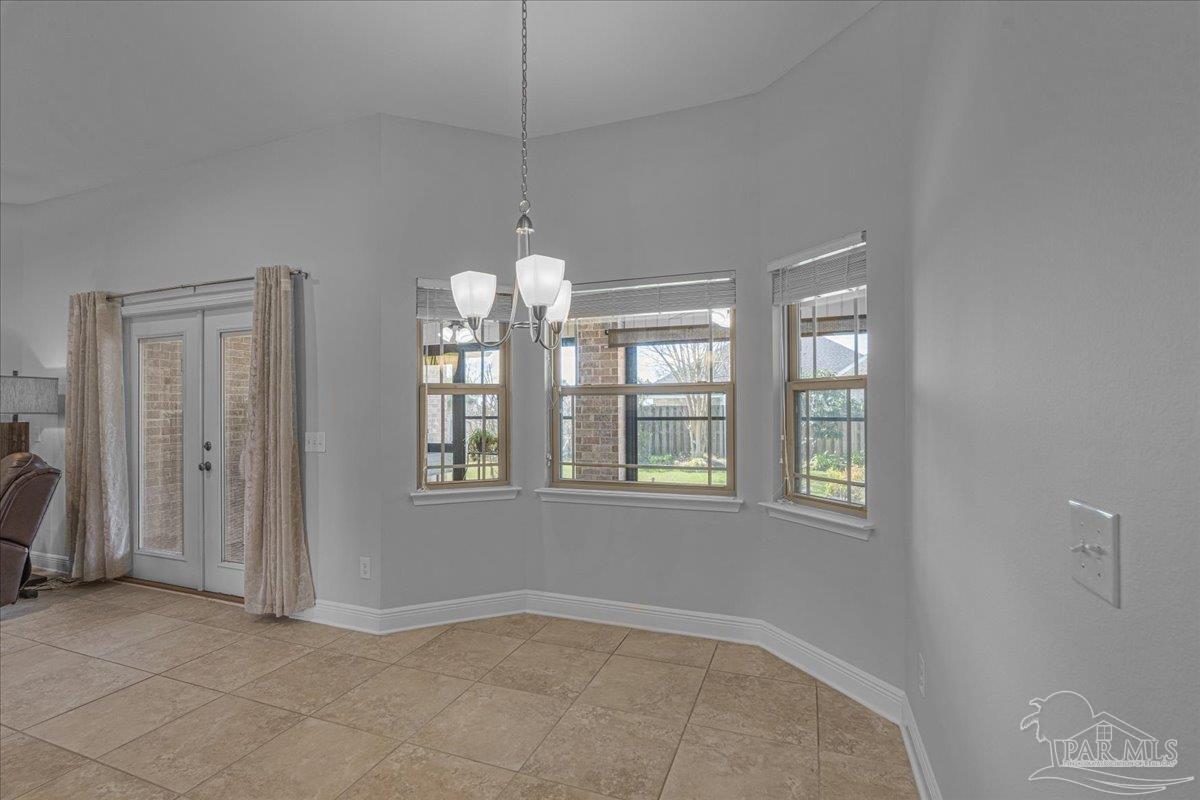 5997 Stonechase Boulevard Pace, FL 32571 - Photo 19 of 52 a view of an empty room with a window
