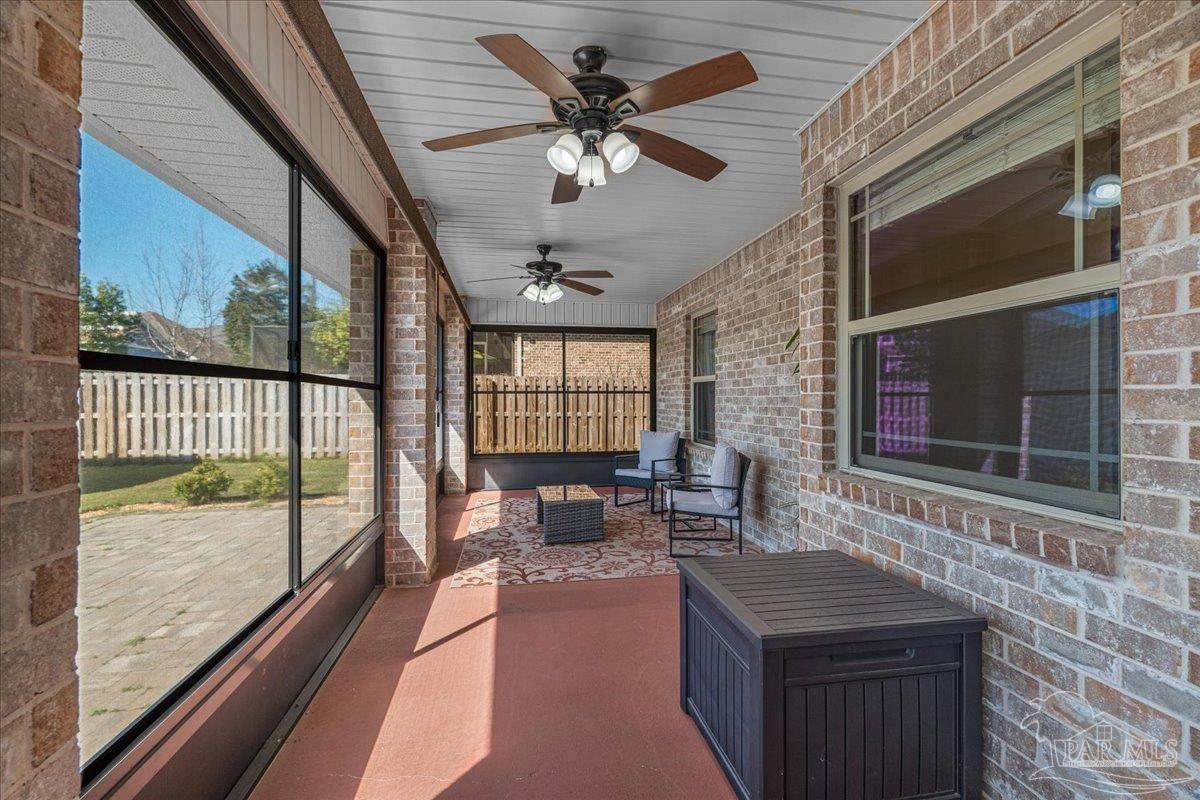 5997 Stonechase Boulevard Pace, FL 32571 - Photo 42 of 52 a living room with furniture