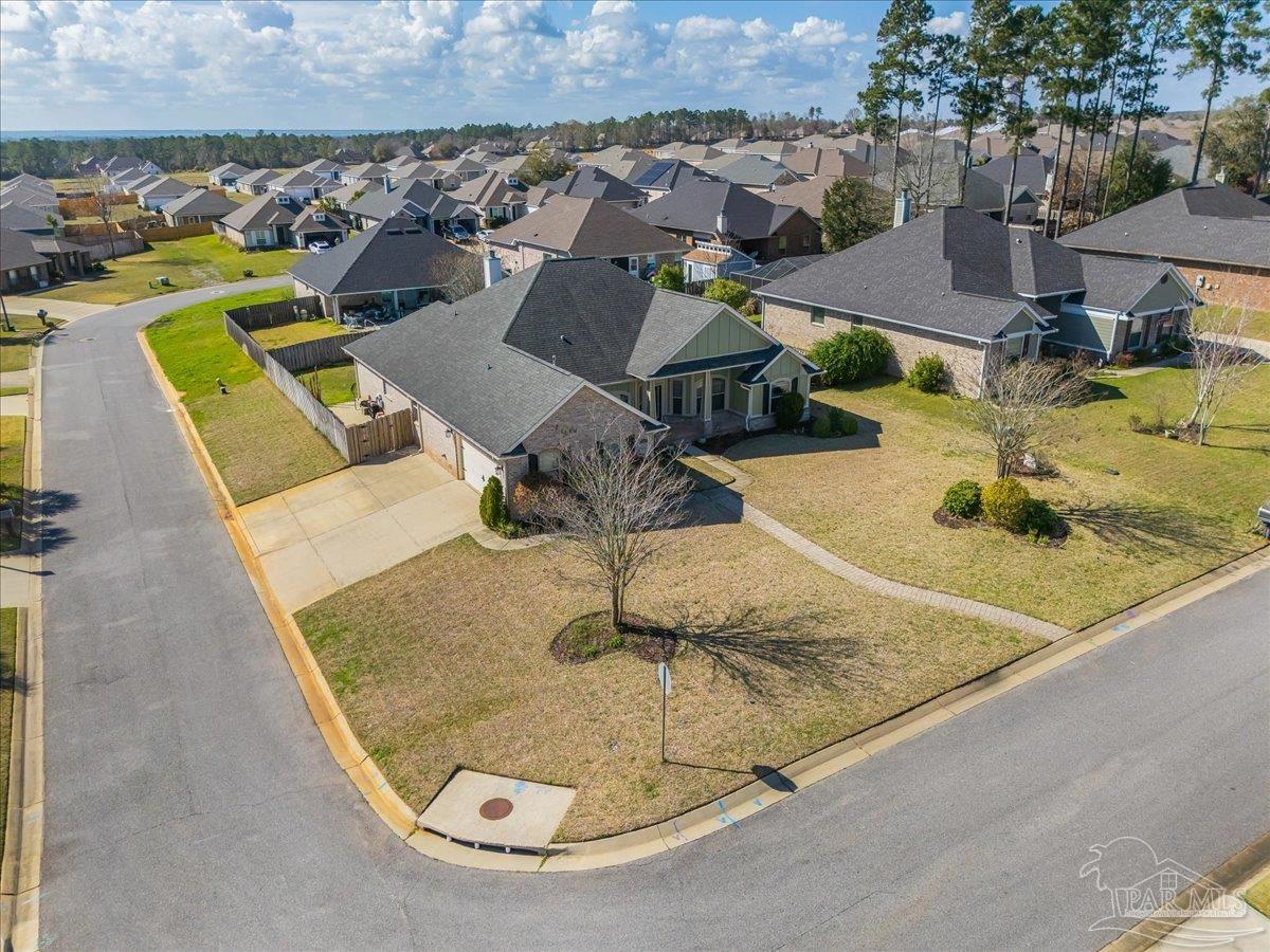 5997 Stonechase Boulevard Pace, FL 32571 - Photo 5 of 52 an aerial view of a swimming pool