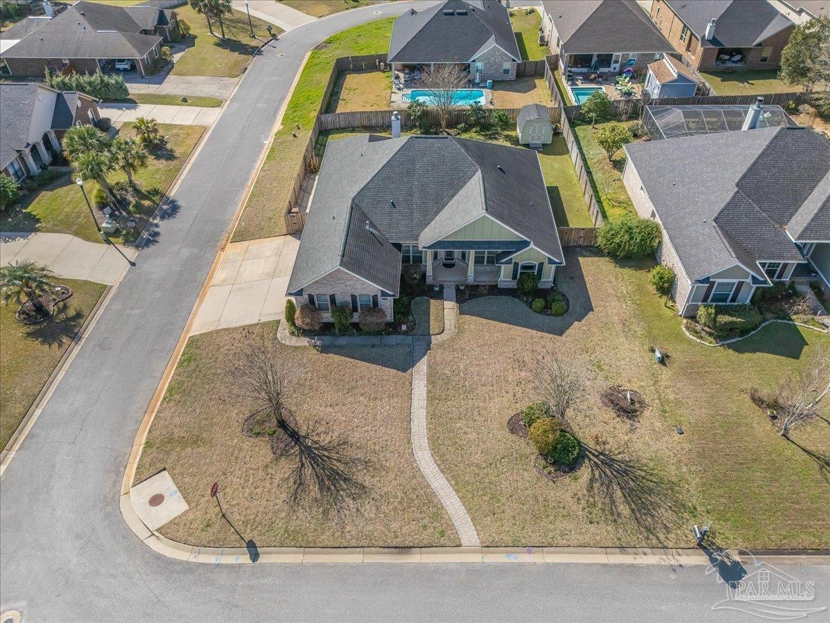 5997 Stonechase Boulevard Pace, FL 32571 - Photo 6 of 52 an aerial view of a swimming pool