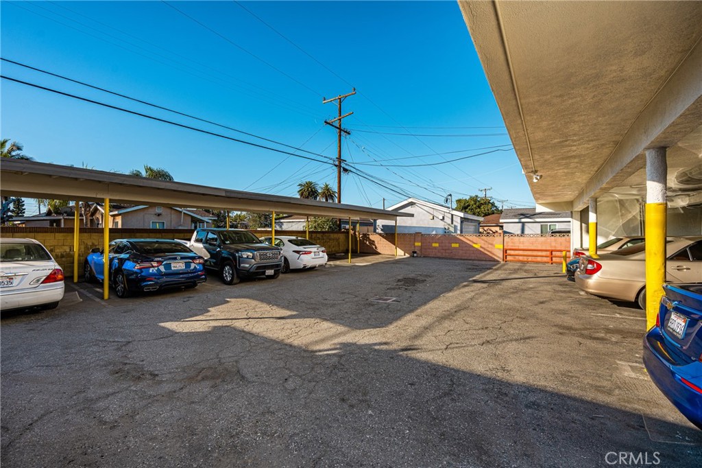 6725 Perry Road Bell Gardens, CA 90201 - Photo 31 of 40 a view of a cars park in front of a building