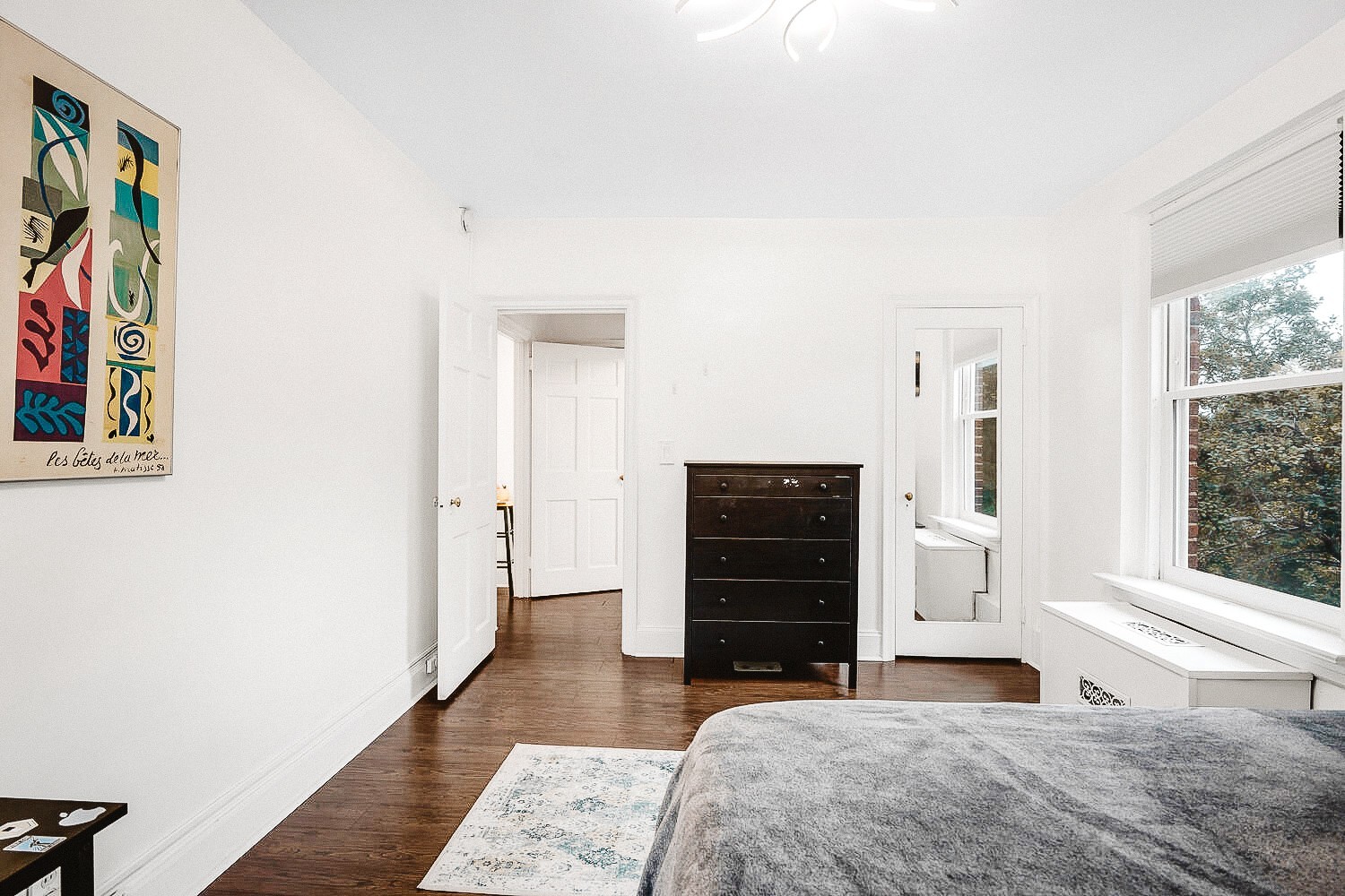 4225 Harding Pike, Unit 408 Nashville, TN 37205 - Photo 13 of 19 a bedroom with a bed and a window