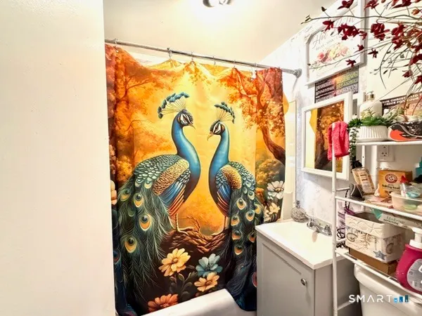 a view of an house with backyard porch and furniture