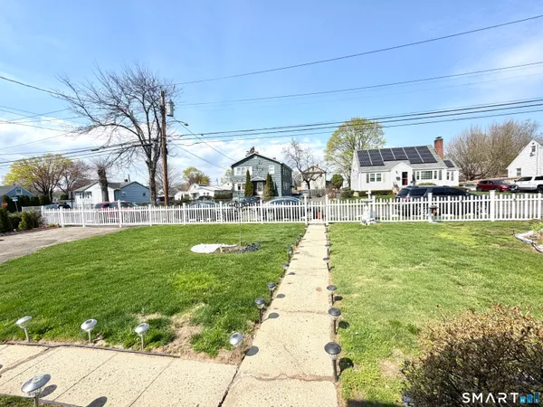 a view of a car parked in front of house