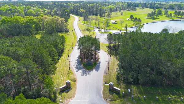 a view of a lake with a yard