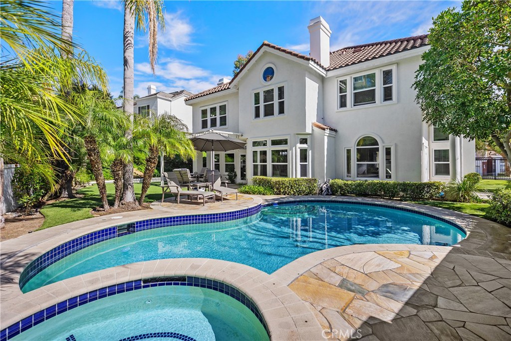 27121 Woodbluff Road Laguna Hills, CA 92653 - Photo 30 of 30 a view of a house with swimming pool