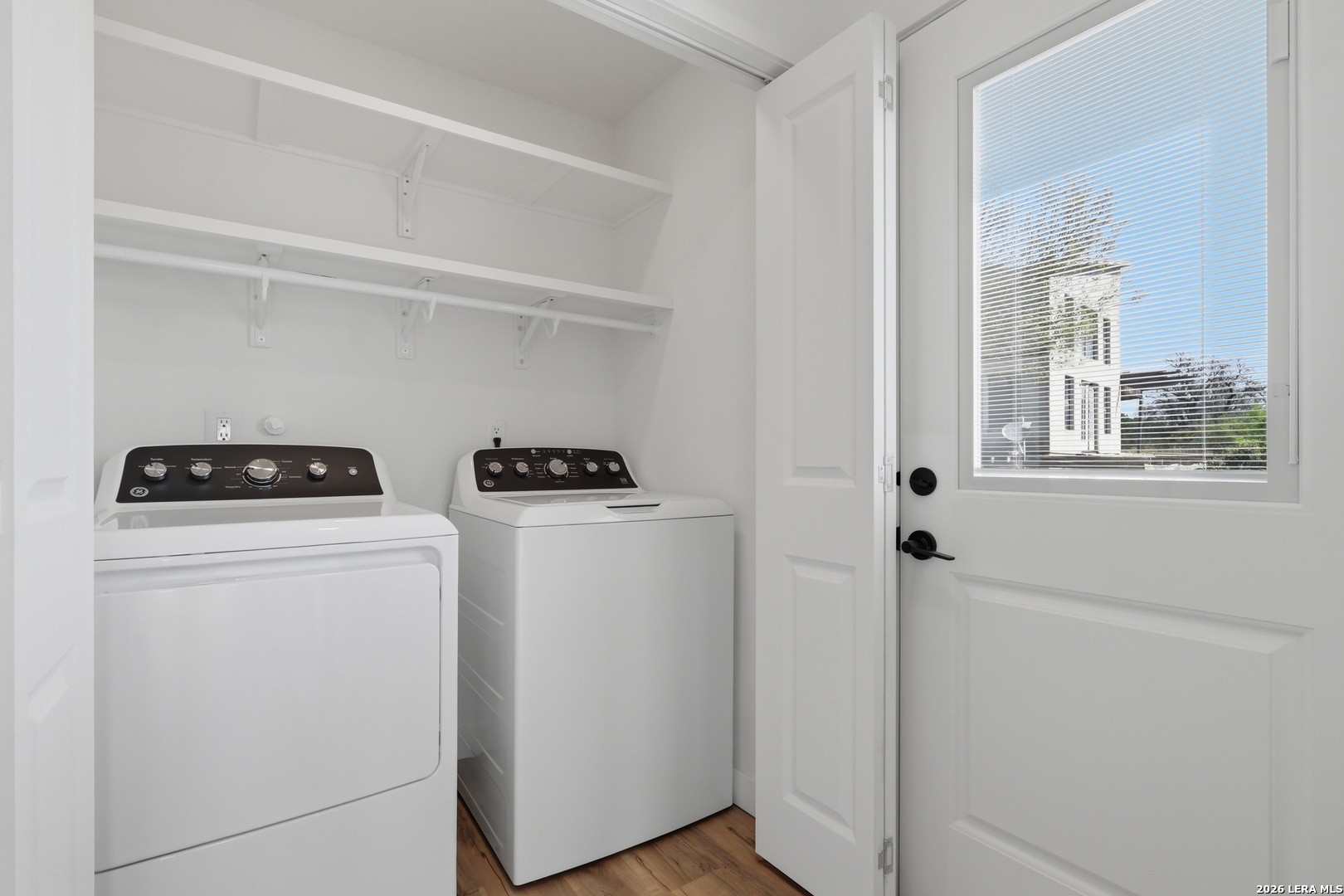 1333 Comanche Path Bandera, TX 78003 - Photo 19 of 41 a utility room with dryer and washer