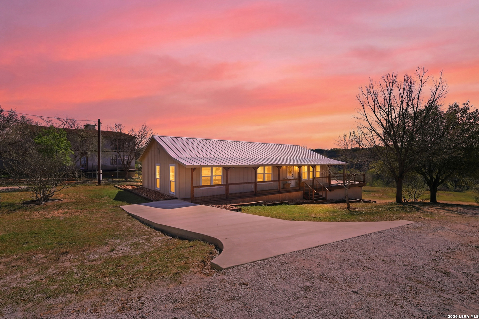 1333 Comanche Path Bandera, TX 78003 - Photo 3 of 41 a view of a house with a yard and sitting area