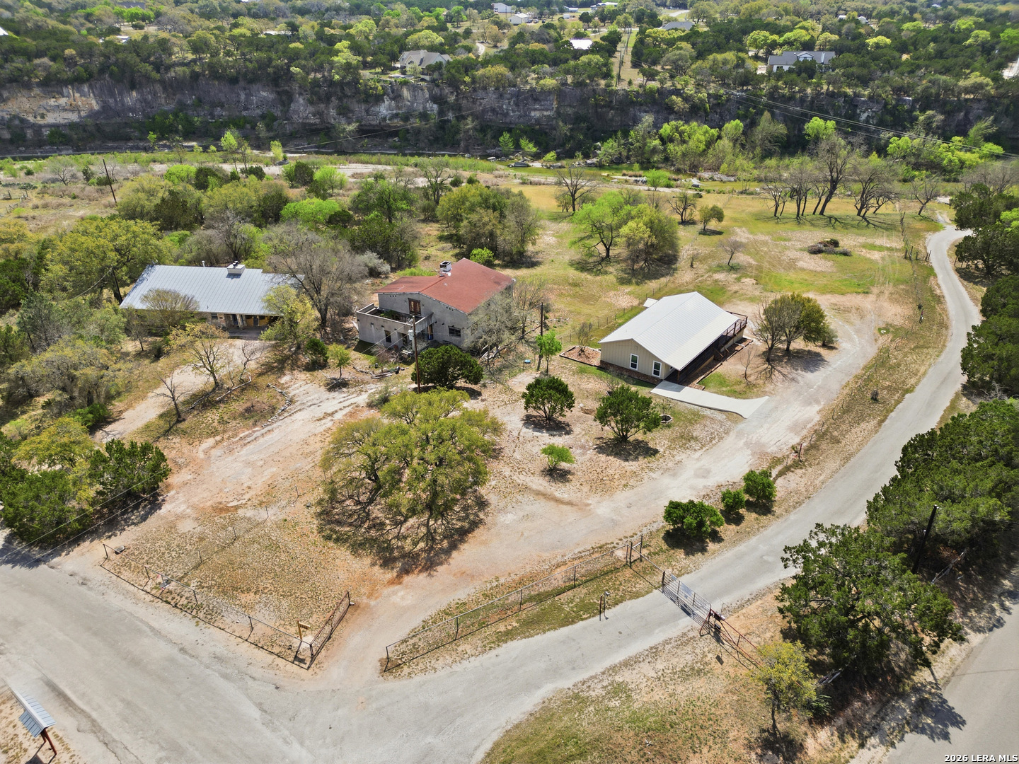 1333 Comanche Path Bandera, TX 78003 - Photo 37 of 41 an aerial view of residential houses with outdoor space