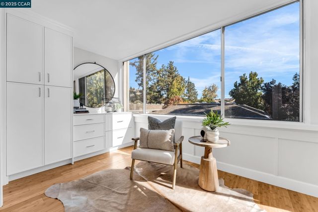 a view of a chairs and table in a patio