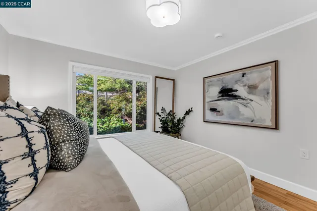 a bathroom with a shower sink and mirror