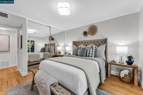 a view of a hallway with washer and dryer
