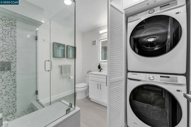 a bathroom with a shower and toilet