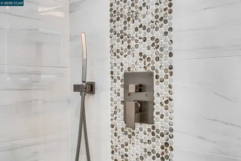 a view of a garden with a building in the background