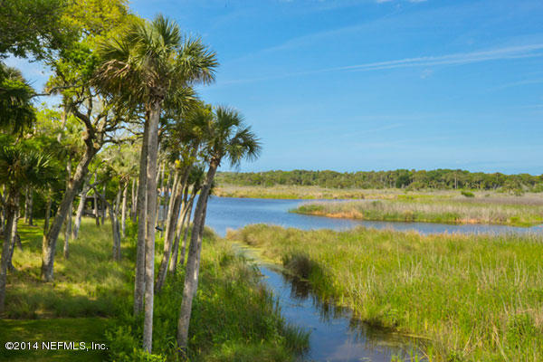 1126 Neck Road Ponte Vedra Beach, FL 32082 - Photo 19 of 32 a view of an ocean from a yard