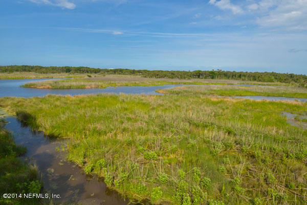 1126 Neck Road Ponte Vedra Beach, FL 32082 - Photo 22 of 32 a view of an ocean from a yard