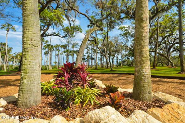 1126 Neck Road Ponte Vedra Beach, FL 32082 - Photo 24 of 32 a view of a yard with plants and trees