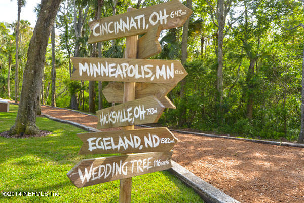 1126 Neck Road Ponte Vedra Beach, FL 32082 - Photo 29 of 32 a view of outdoor space with sign board and garden