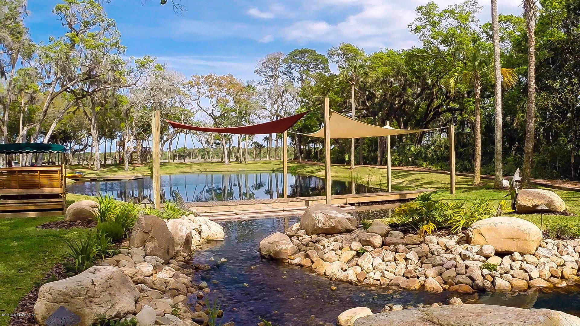 1126 Neck Road Ponte Vedra Beach, FL 32082 - Photo 6 of 32 a view of a chair and tables in the patio
