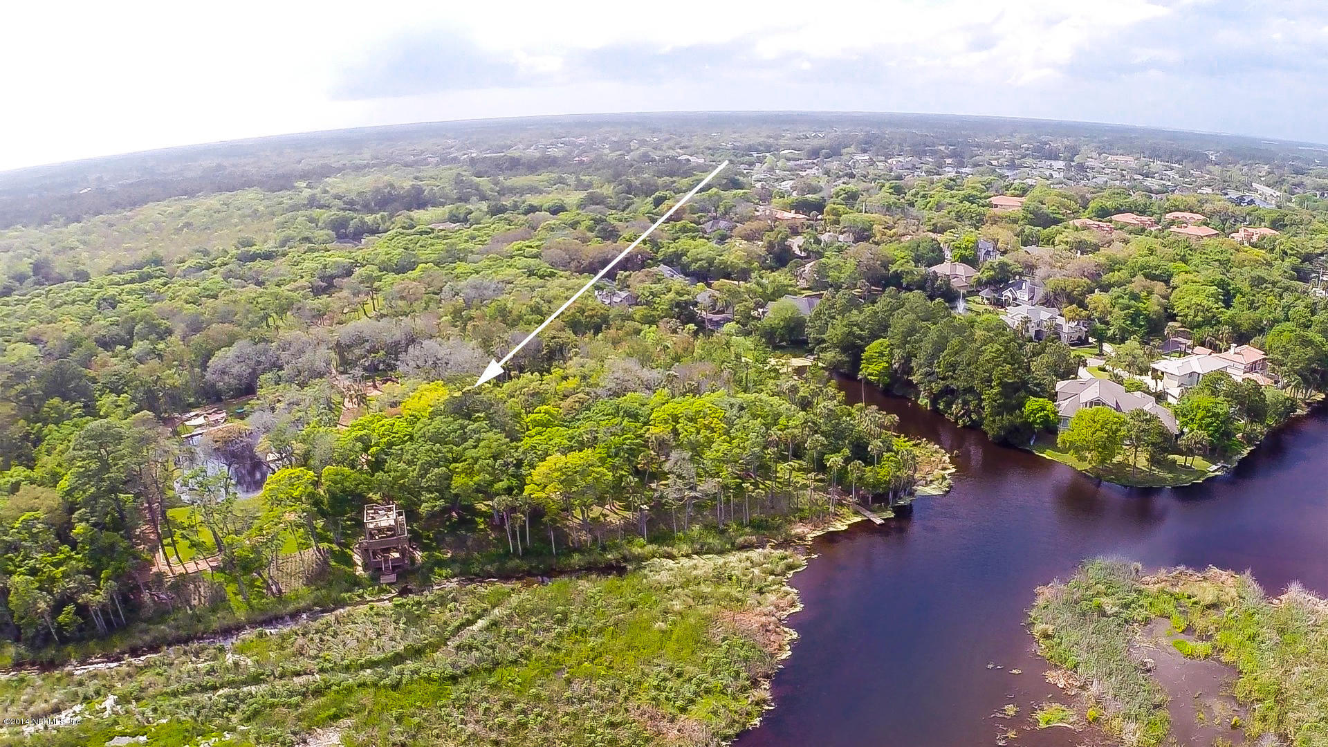 1126 Neck Road Ponte Vedra Beach, FL 32082 - Photo 9 of 32 an aerial view of a houses with a yard