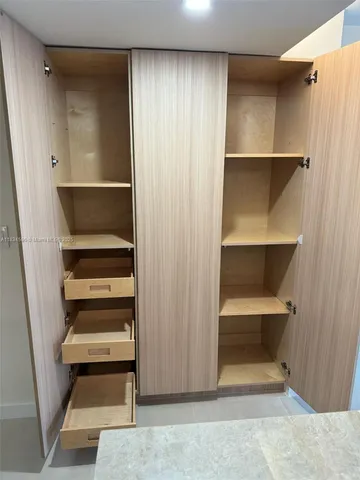 a utility room with washer and dryer