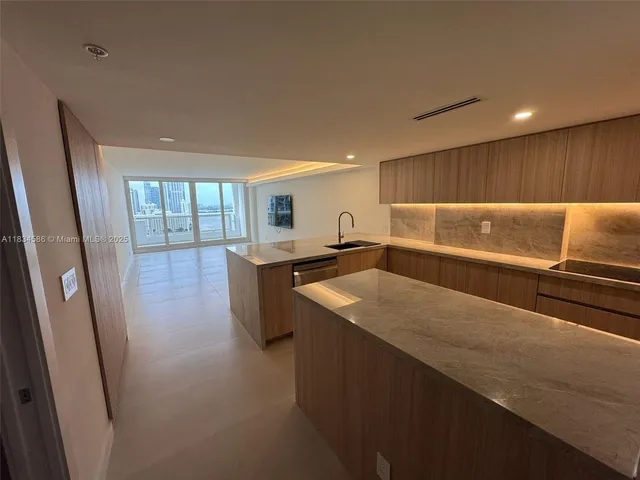 a view of kitchen with counter top space