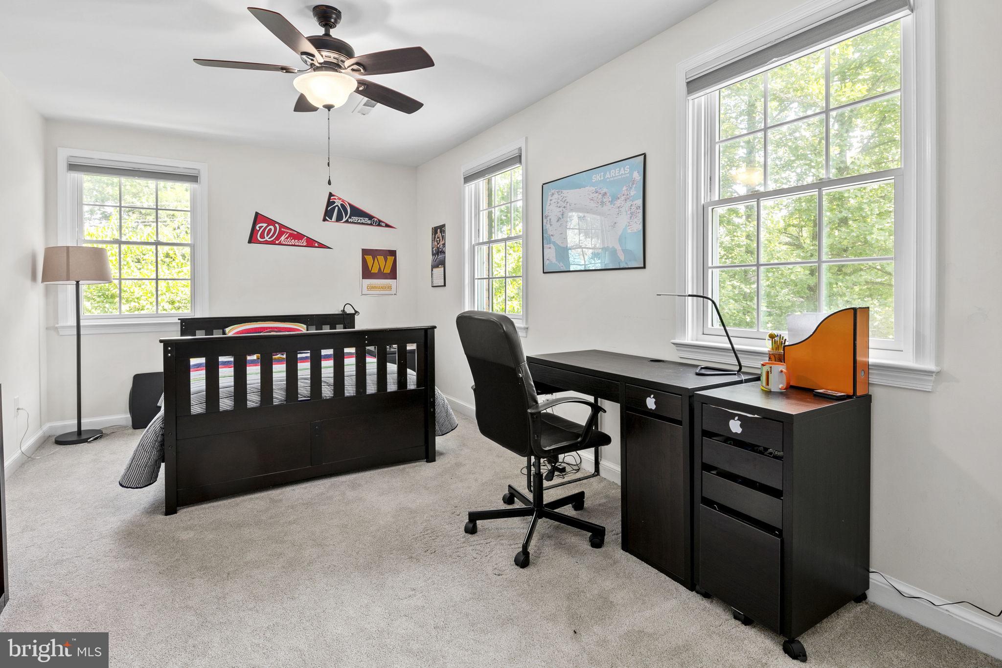 6916 Seven Locks Road Cabin John, MD 20818 - Photo 24 of 38 a bedroom with a workspace