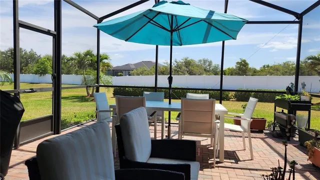 a view of a patio with swimming pool