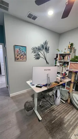 a workspace with furniture and window