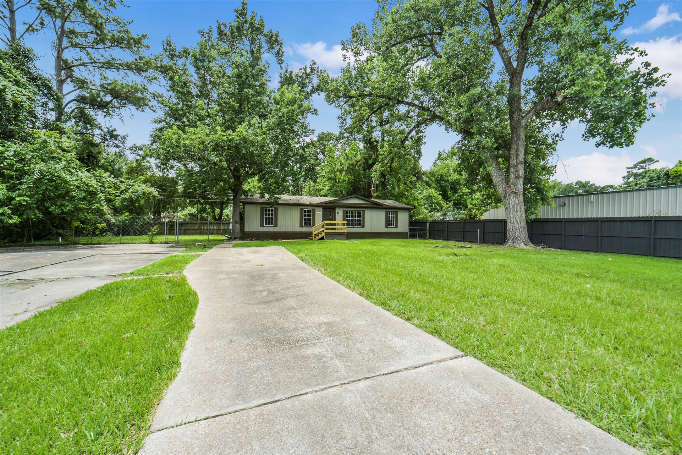 11023 Forrest Valley Drive Houston, TX 77065 - Photo 35 of 47 a view of a backyard with a garden