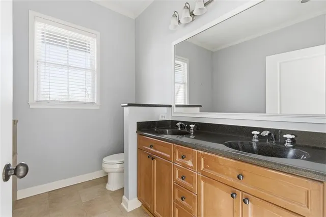 a white bath tub sitting next to a window