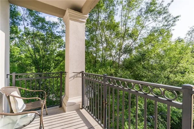 a balcony with an outdoor space