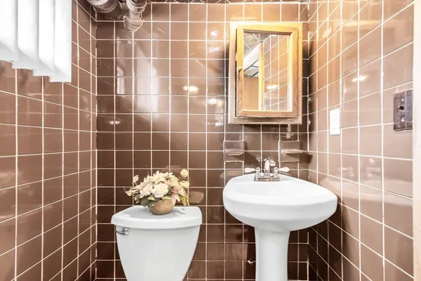 swimming pool view with a outdoor seating space