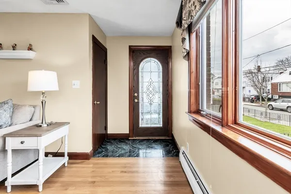 a view of a hallway with windows