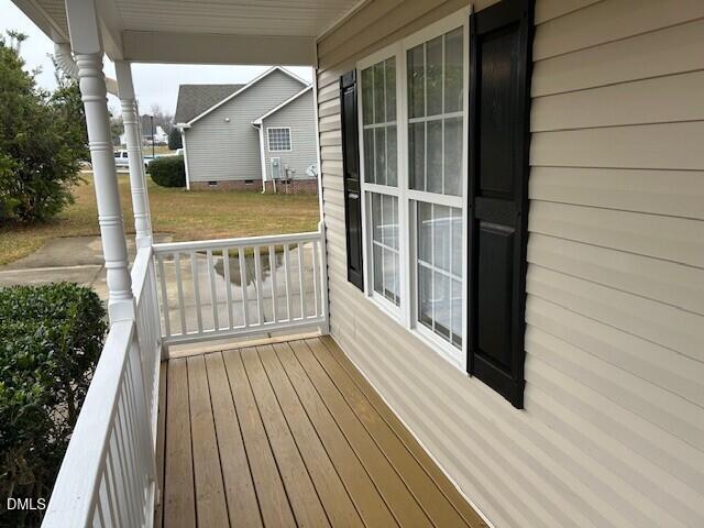 85 Opal Lane Clayton, NC 27520 - Photo 2 of 15 a view of deck with wooden floor and fence
