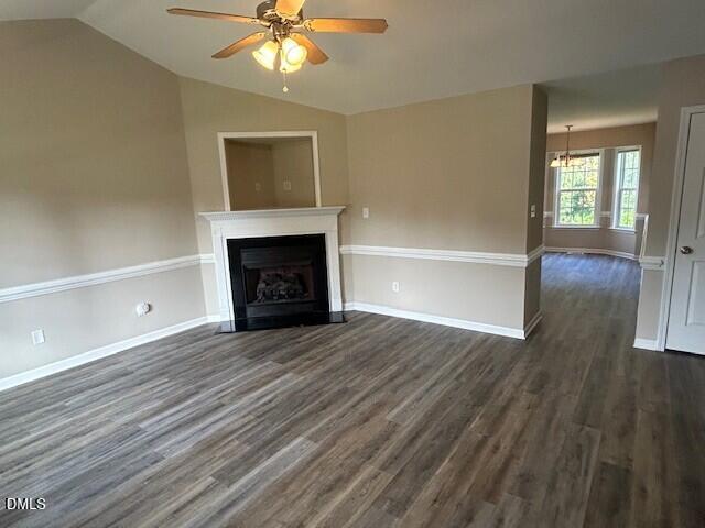 85 Opal Lane Clayton, NC 27520 - Photo 3 of 15 wooden floor fireplace and windows in an empty room