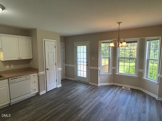 85 Opal Lane Clayton, NC 27520 - Photo 5 of 15 a view of an empty room with window and wooden floor