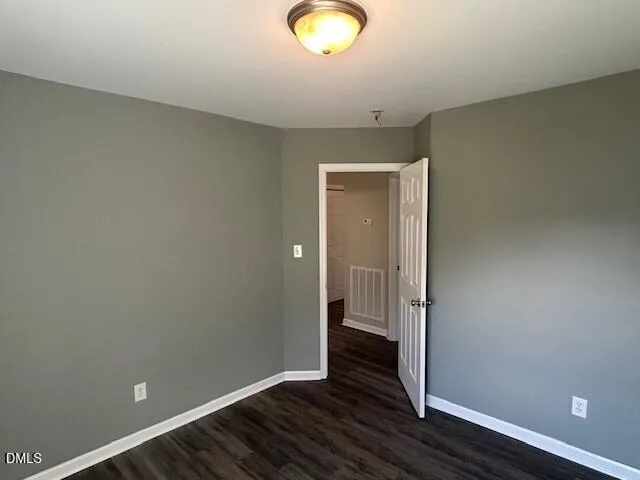 a view of livingroom with wooden floor