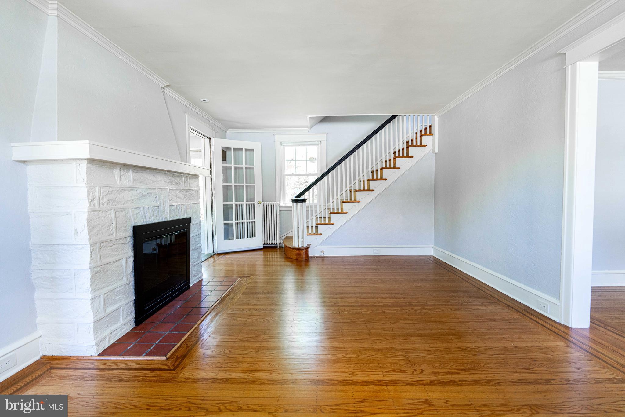 2114 East County Line Road Ardmore, PA 19003 - Photo 11 of 30 Living room and gas fireplace