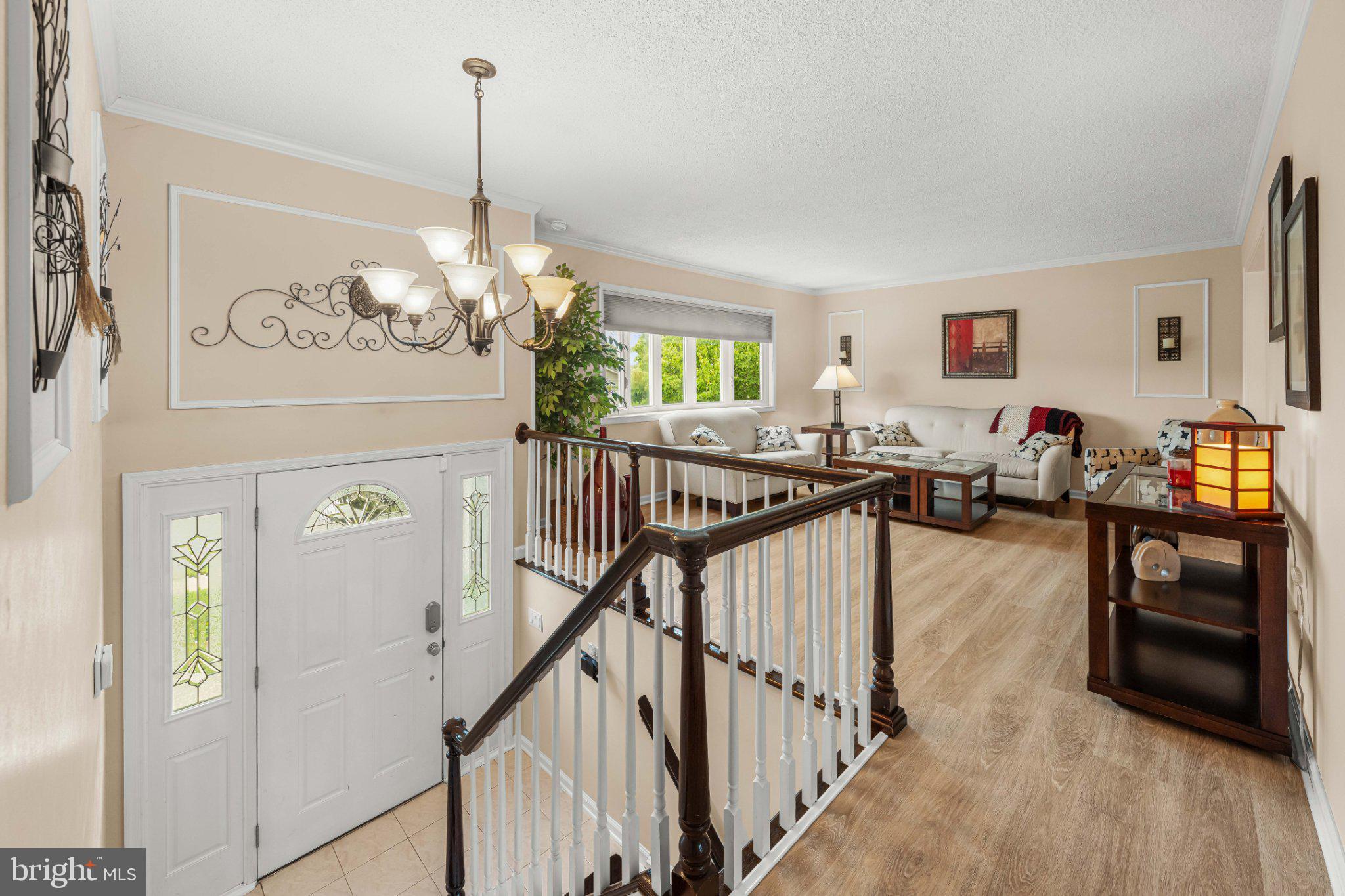 8 Dan Road Hamilton, NJ 08620 - Photo 6 of 49 Inviting entryway with warm ambiance.