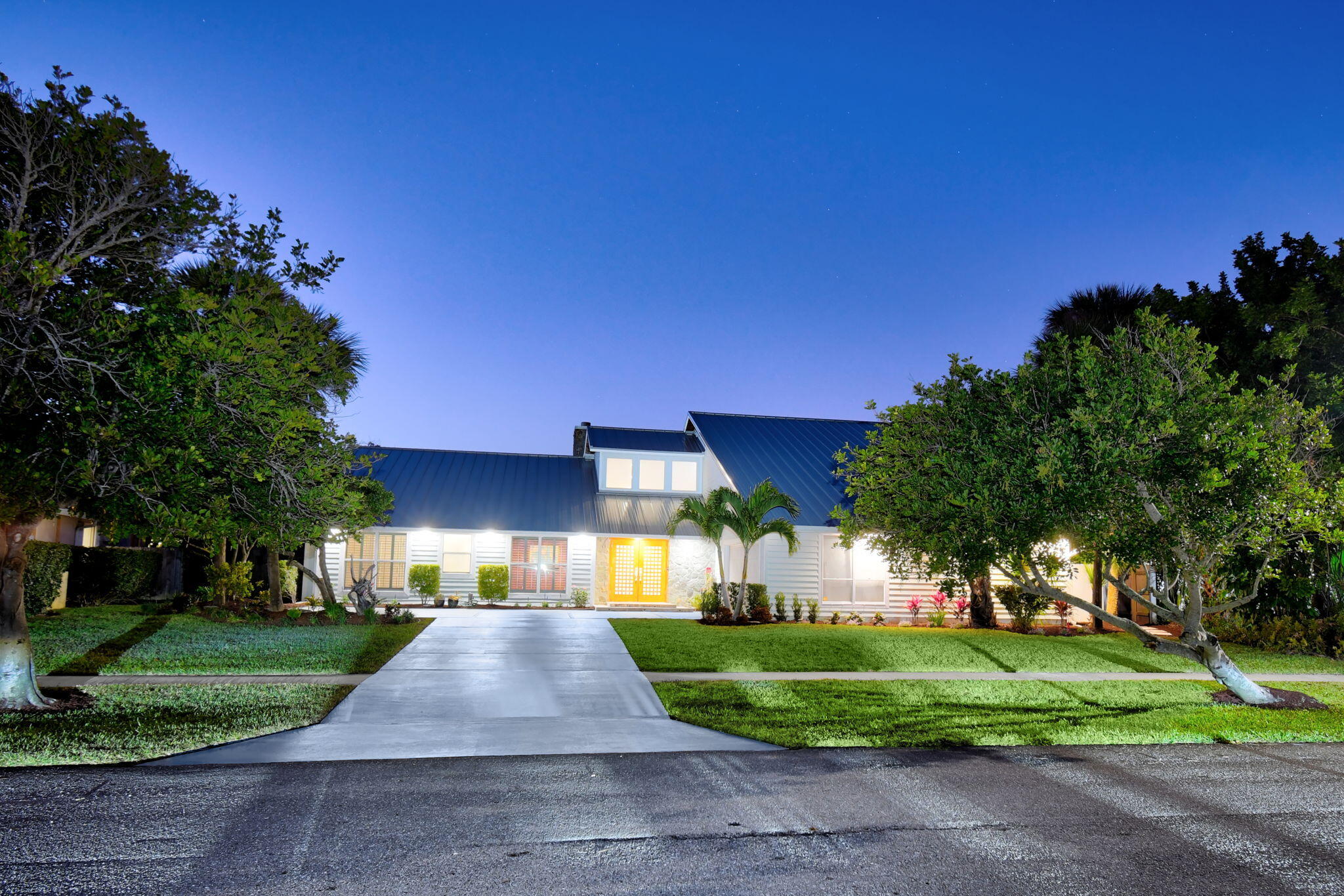 123 Olympus Way Jupiter, FL 33477 - Photo 116 of 116 a front view of a house with a yard