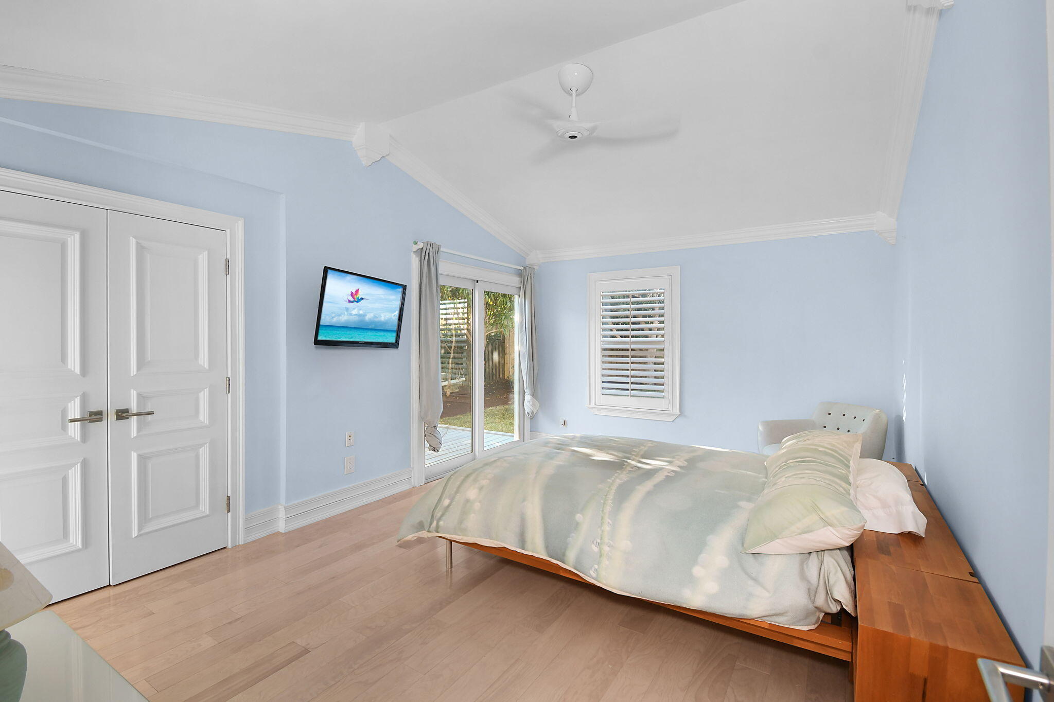 123 Olympus Way Jupiter, FL 33477 - Photo 21 of 116 a bedroom with a bed and window