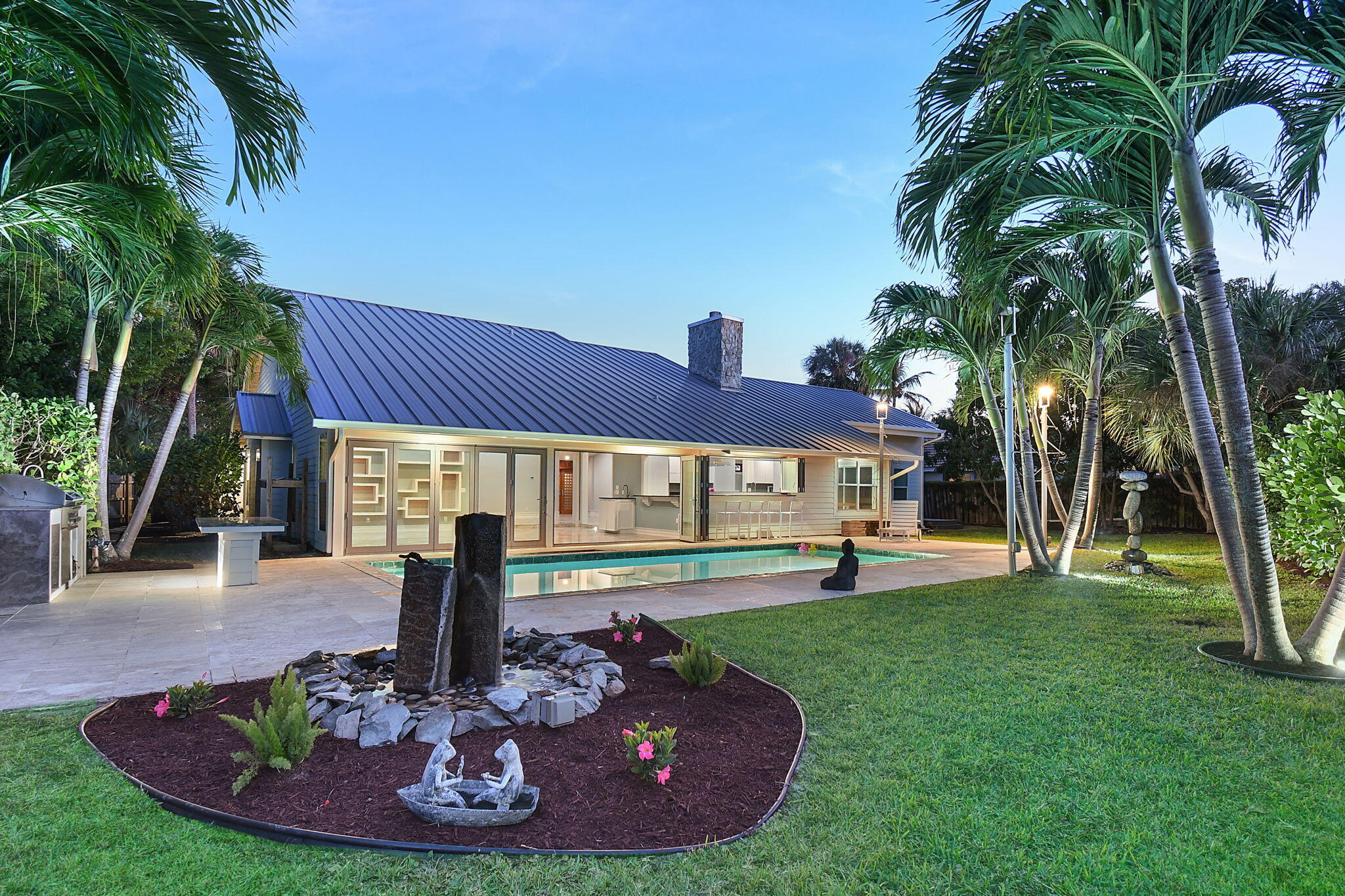 123 Olympus Way Jupiter, FL 33477 - Photo 3 of 116 a view of a house with swimming pool