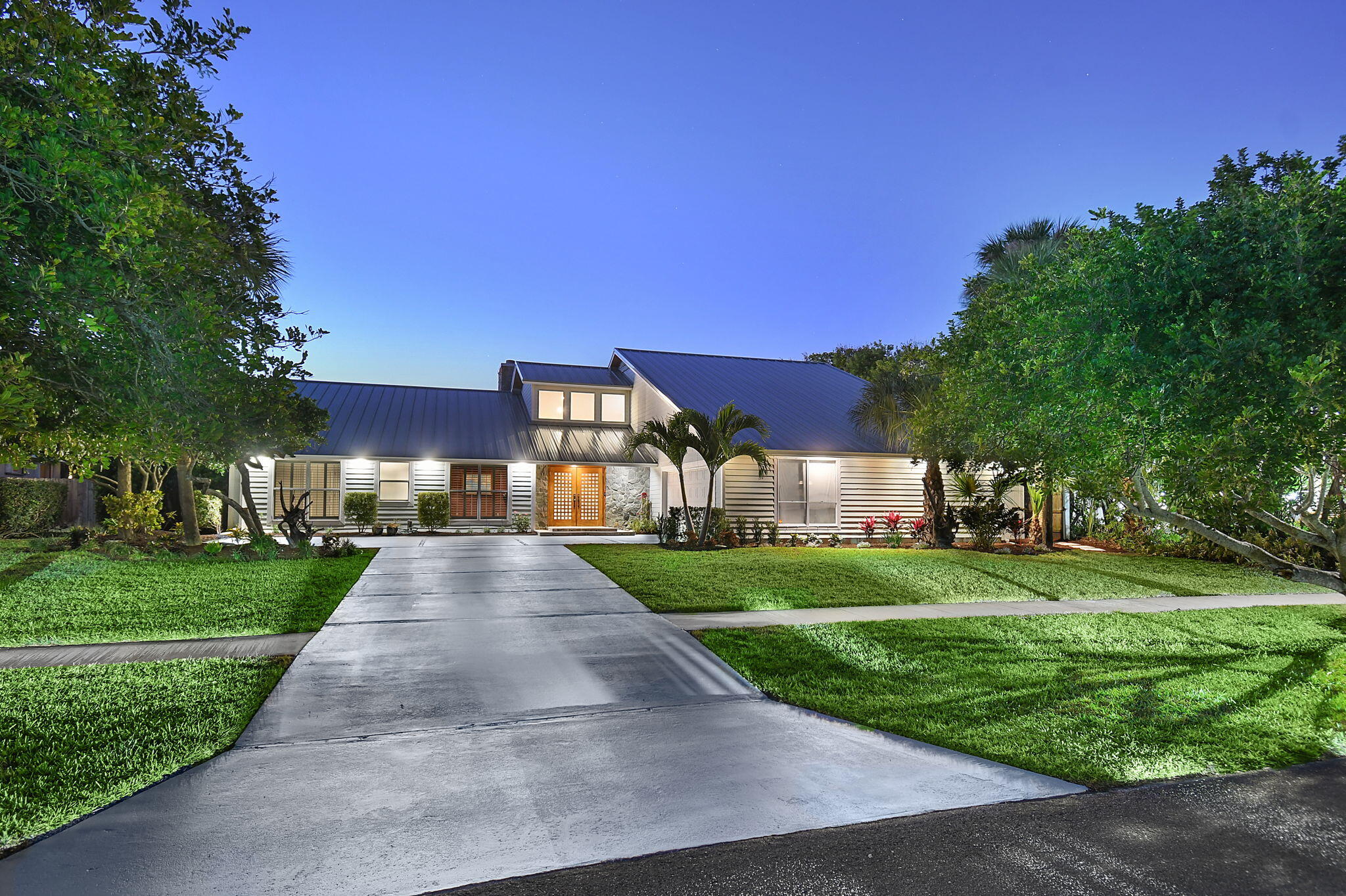 123 Olympus Way Jupiter, FL 33477 - Photo 3 of 116 105-web-or-mls-500_4050 copy 2