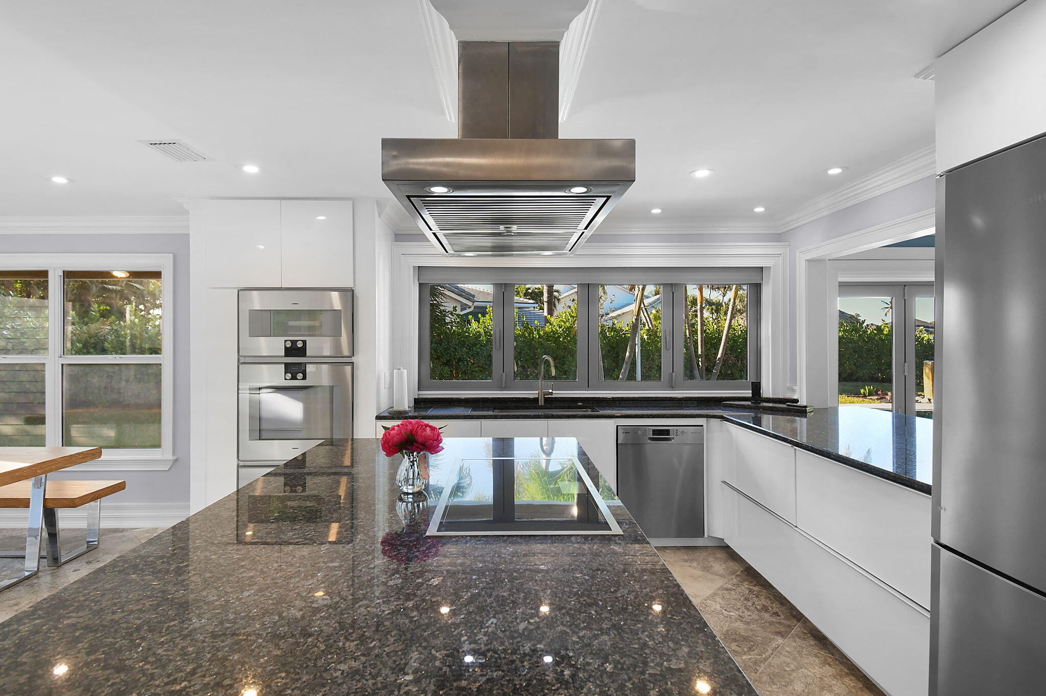 123 Olympus Way Jupiter, FL 33477 - Photo 35 of 116 a very nice looking dining room with a large window