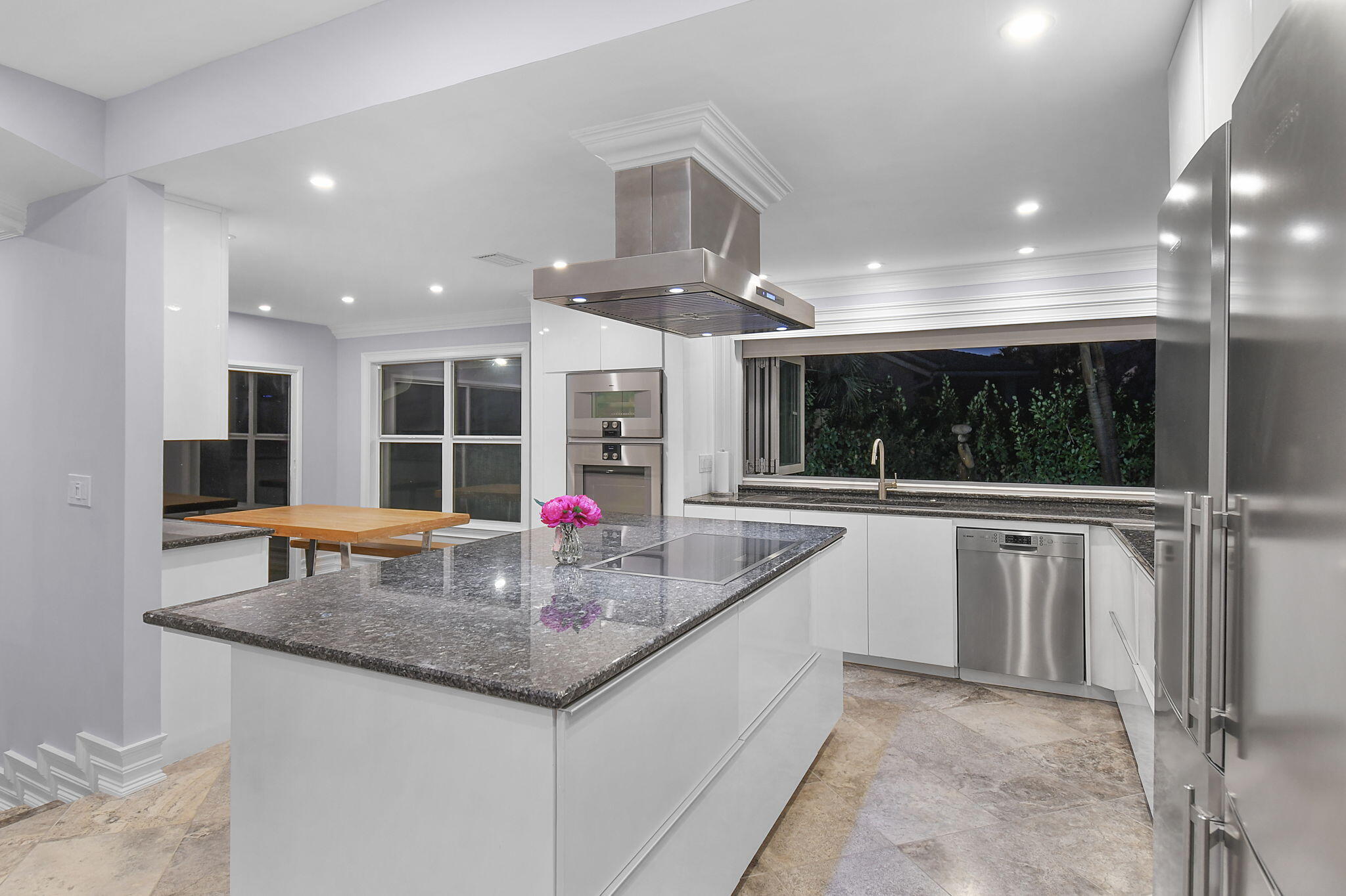 123 Olympus Way Jupiter, FL 33477 - Photo 43 of 116 a kitchen with stainless steel appliances granite countertop a sink and a white cabinets
