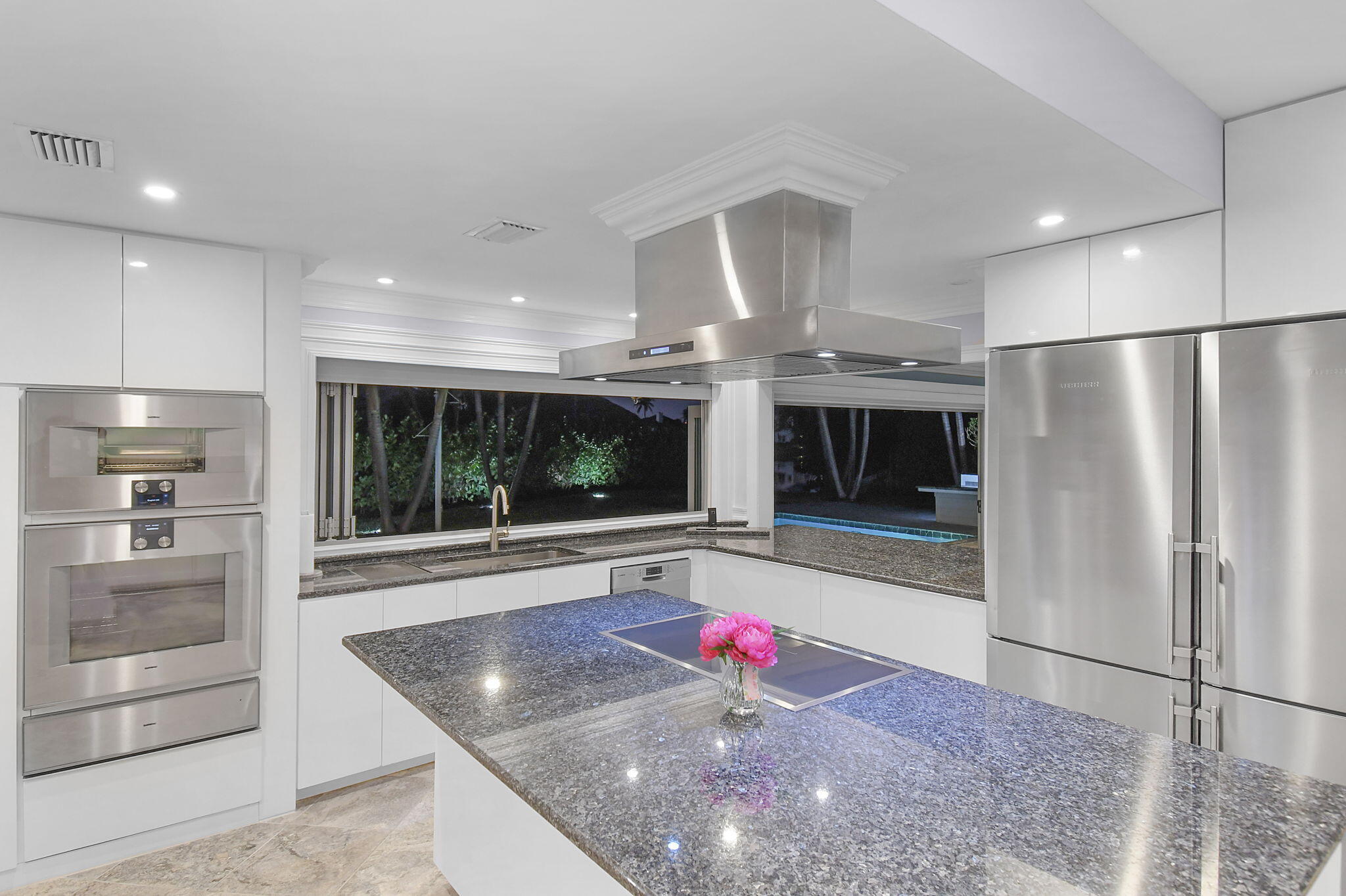 123 Olympus Way Jupiter, FL 33477 - Photo 44 of 116 a view of a kitchen with a sink and a refrigerator